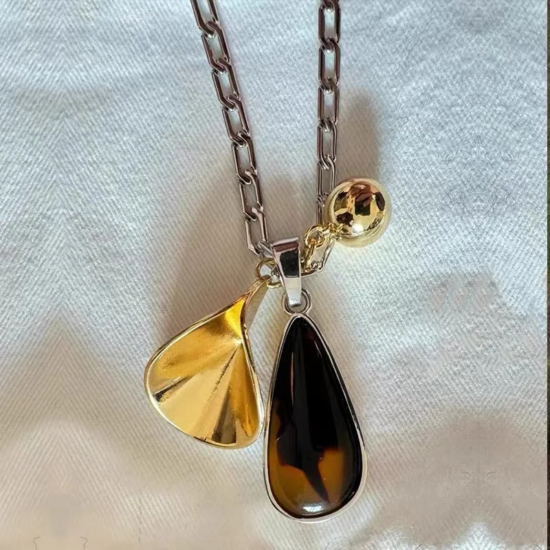 Autumn and winter new amber water droplet pendant necklace, women's long brown sweater chain