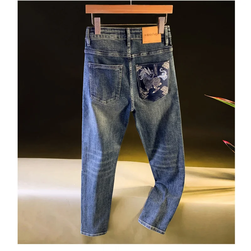 2025 autumn slim fit jeans men's Chinese style embroidered printed small feet casual elastic versatile high-end men's pants