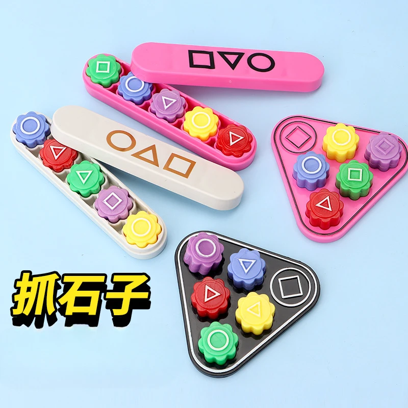 Gioco tradizionale di decompressione delle pietre afferranti