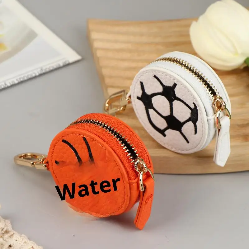 Niedliche Mini-Münztasche aus PU-Leder mit Schlüsselanhänger, kreativer Fußball, Basketball, Rugby-förmiger Schlüsselanhänger, Kopfhörer-Aufbewahrungstasche, Anhänger