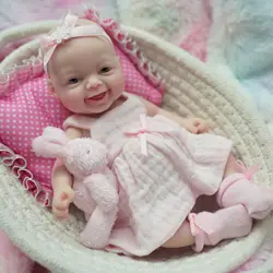 Miniature Babies 7 Inch Silicone Full Body reborn Baby Doll Smile Baby Girl Dolls That Looks Real with Pink Dress for Ages 3 +