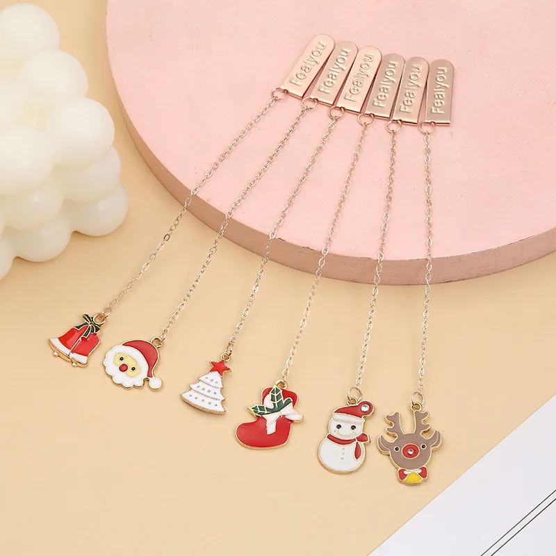 

40 pcs/lot Santa Claus Christmas tree Elk Metal Pendant Bookmark Cute Book marks for book Paper Clip School Office Supplies