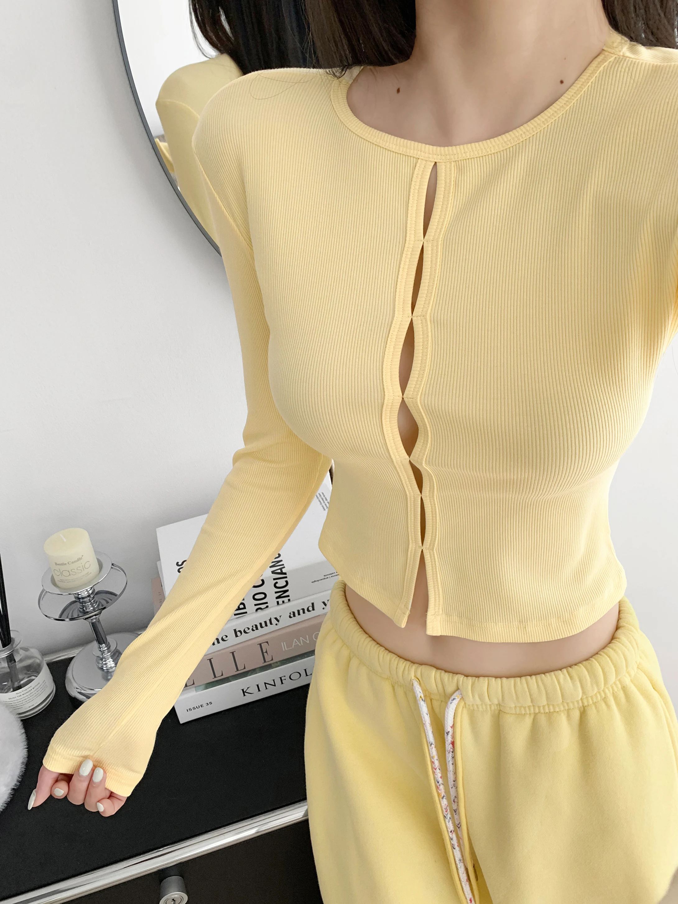 

Spicy Girl Sle ort Svel Hollow out Knitted Cardigan round Ne Long Sve Pure Color Slim Fit Early Spring Top