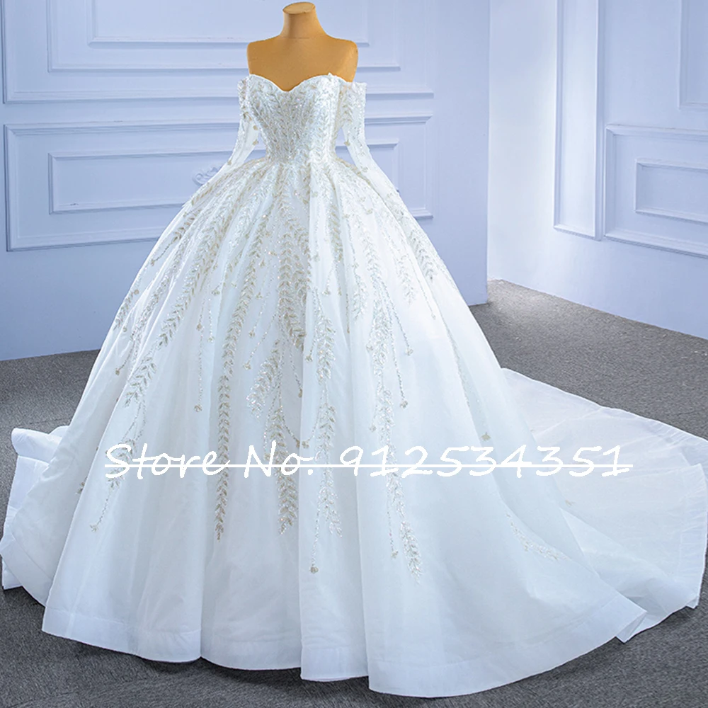 Robe Mariage แขนยาว Tulle ชุดราตรีงานแต่งชุดปิดไหล่ Shining Vestidos De Novia Sequined ประดับด้วยลูกปัด Trouwjurk