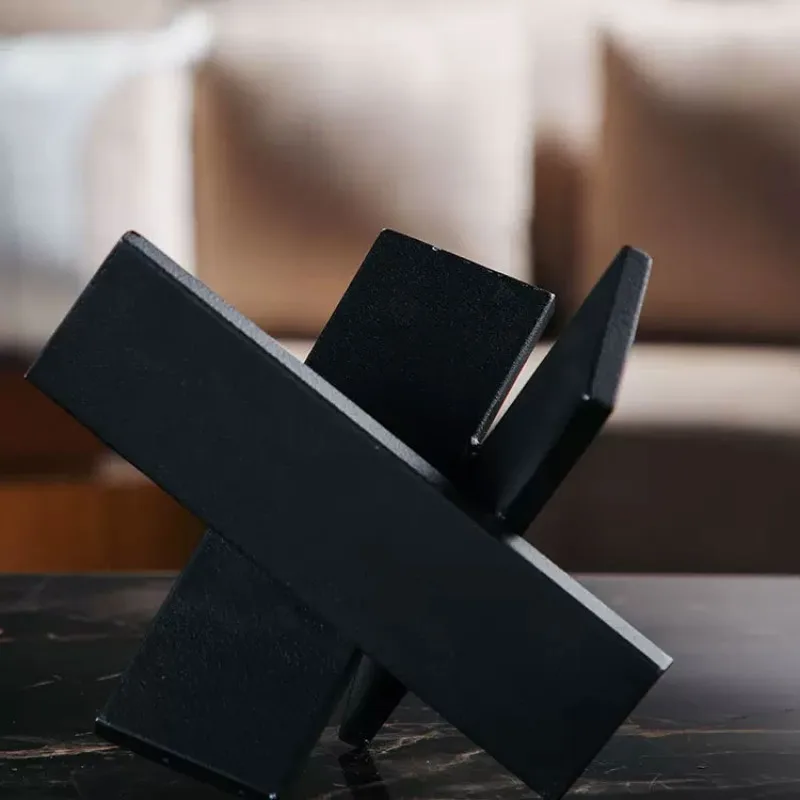 Modern simple metal black sandblasted cross-folding ornaments, soft decoration for sample cabinets in the exhibition