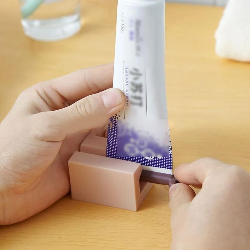 Picture 6: Toothpaste Squeezer Rolling Tube Toothpaste Squeezer with Frosted Handles Toothpaste Holder Stand Bathroom