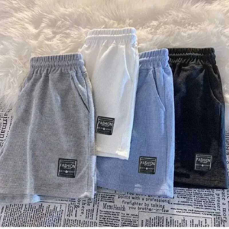 

Летние женские шорты с высокой талией из вафельной ткани, свободные, повседневные, с широкими штанинами, мягкой эластичной резинкой на талии, однотонные, для пляжа, модные, 2026