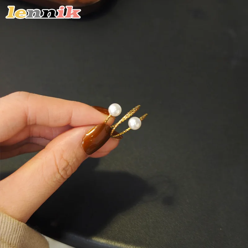 LENNIK Multi Layer Line Pearl Ring, Female Niche Design, Fashionable and High-end Sense, Movable Titanium Steel Gold Ring