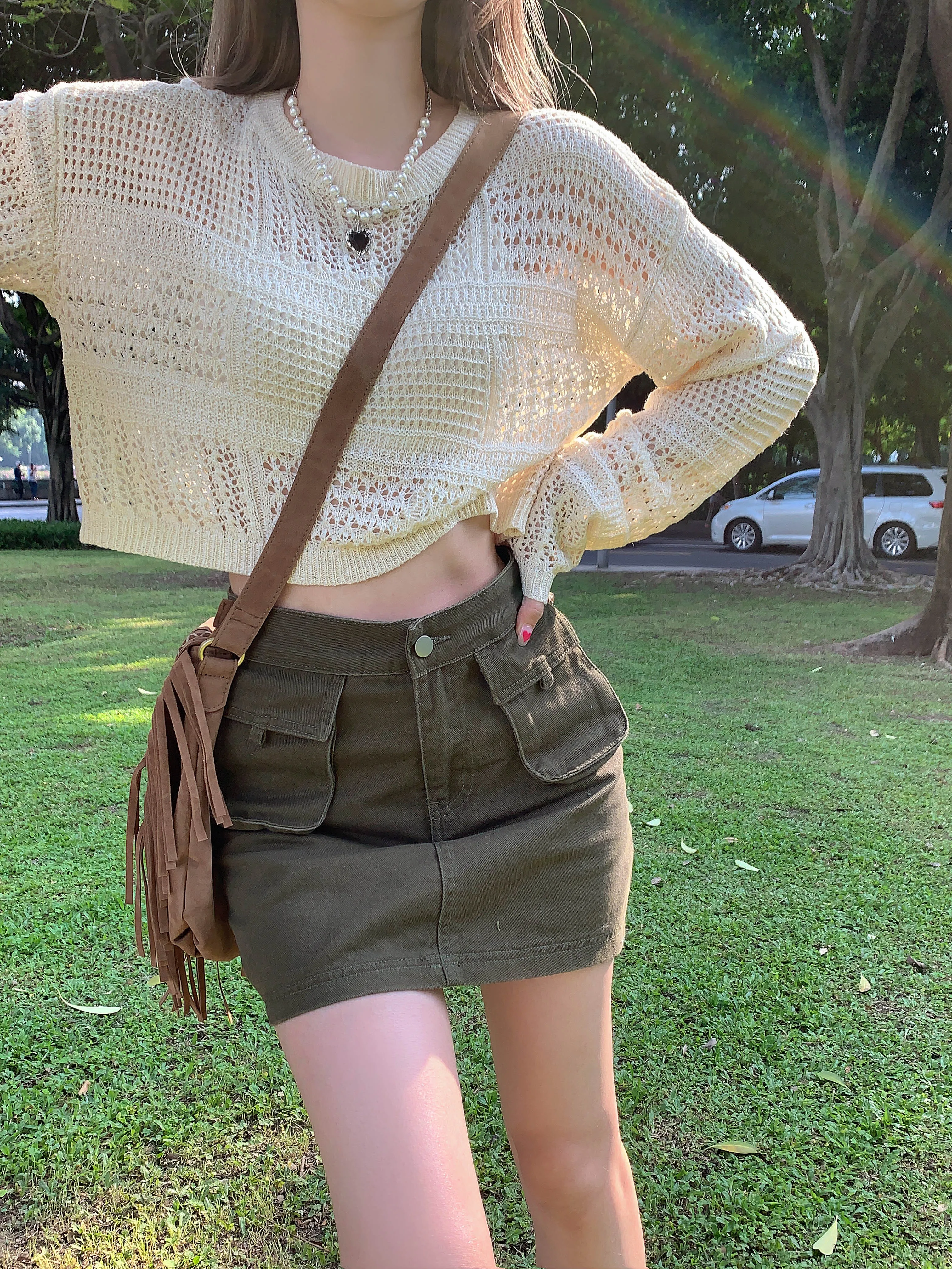 

Short Hollow Sunscreen Knitted Blouse Women Summer Loose Long-sleeved Top + Button Closed Pockets Decorative Skirt Two-piece Set