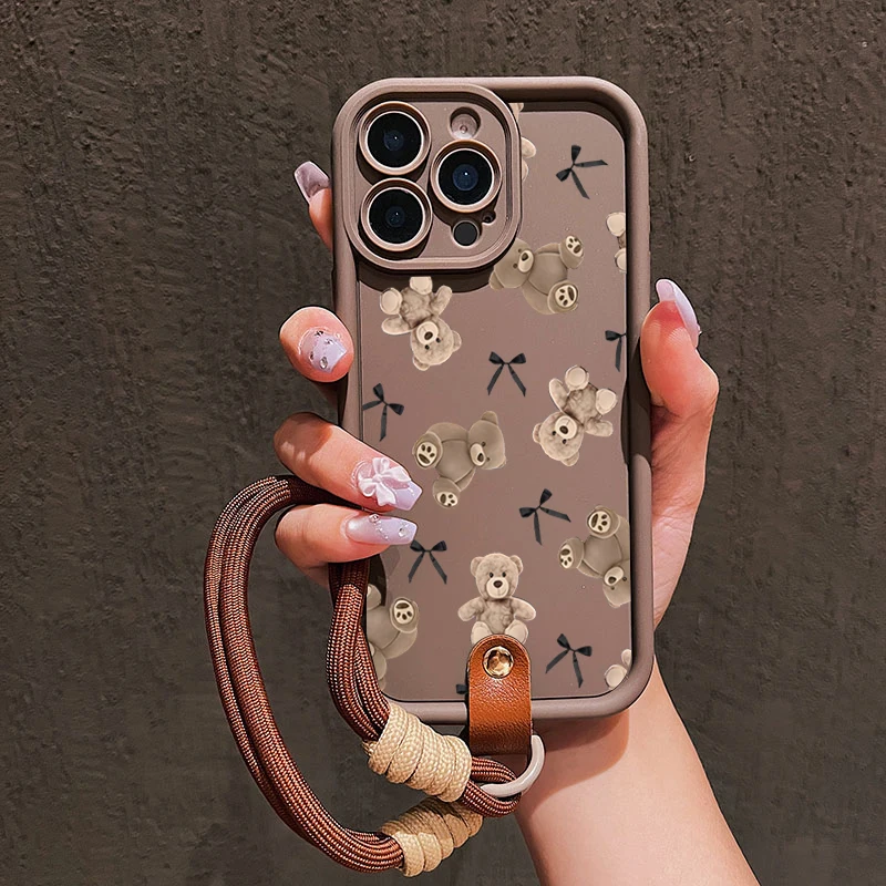 Niedliche Schleifenbär-Handyhülle mit Lanyard für iPhone 14 15 16 17 Pro Max 14 13 12 11 Pro Plus Stoßfeste Matte Silikonhülle – Detail 2