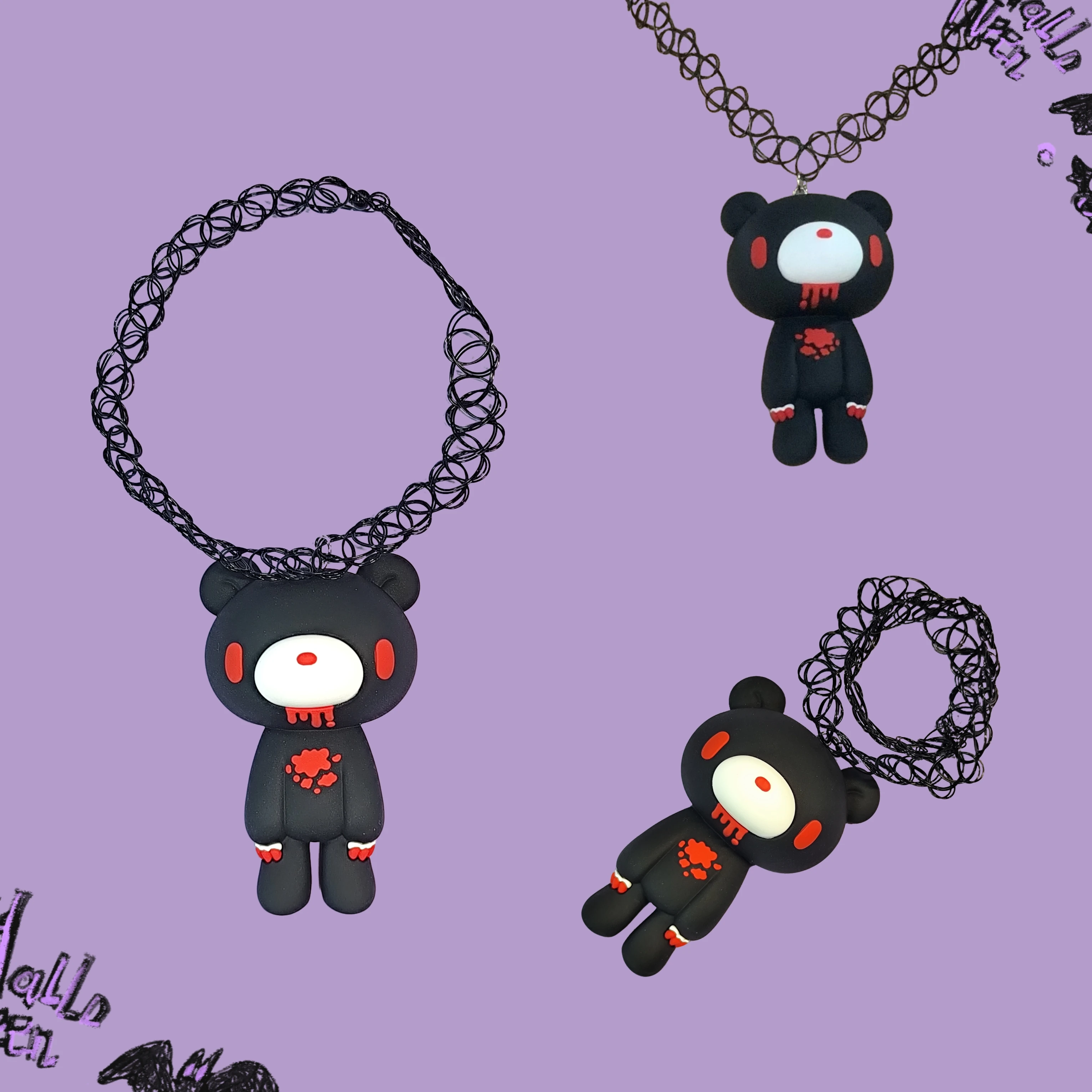 Gothic necklaces with black, bloody - detailed bear pendants on curly chains. Perfect spooky accessories.