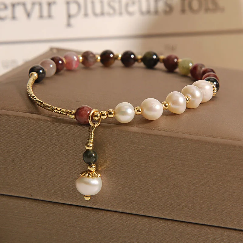 

Purely handmade - natural tourmaline pearl bracelet for women, shipped in random styles.