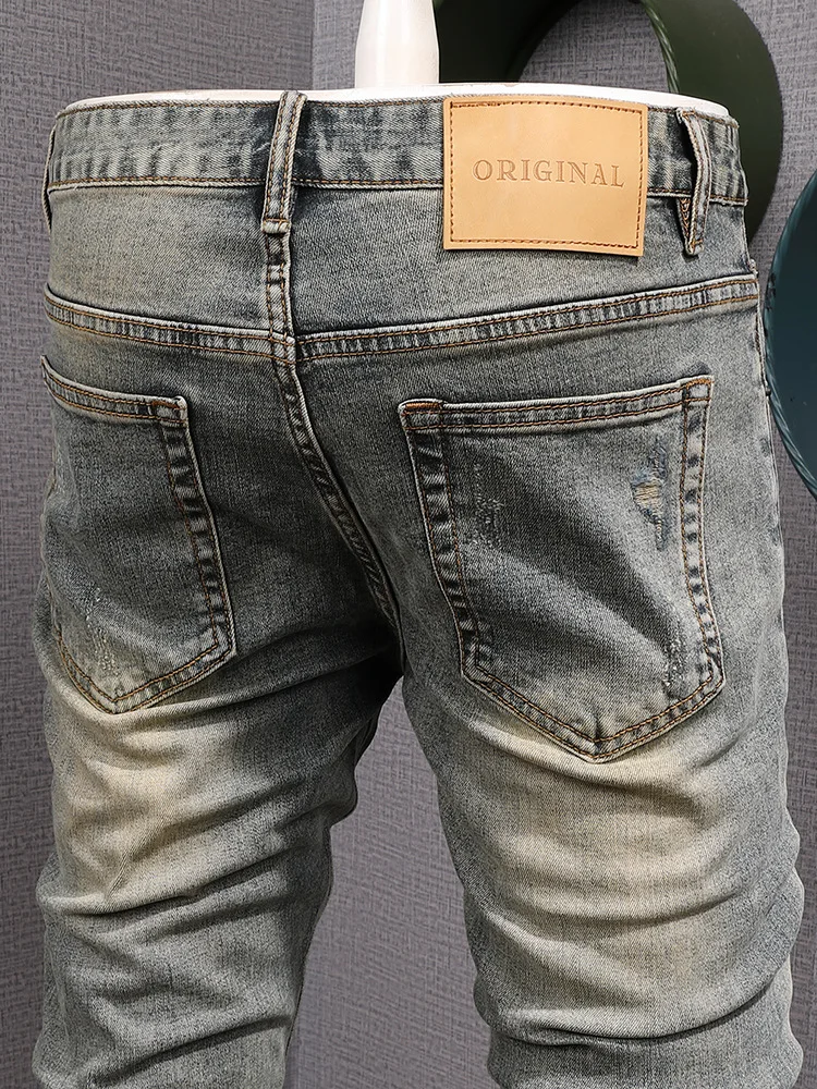 

2025Новые мужские джинсы с девятью точками в стиле ретро и рваными заплатками, потертые, модный уличный стиль, эластичные узкие брюки