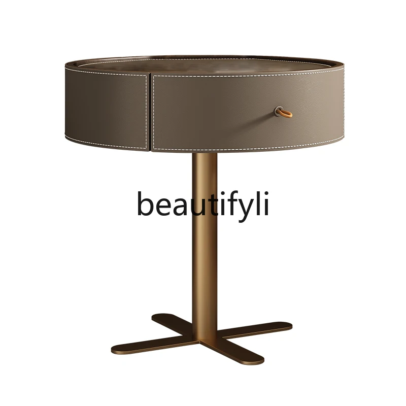 

Italian minimalist saddle leather round bedside table modern small apartment bedroom home designer creative side table