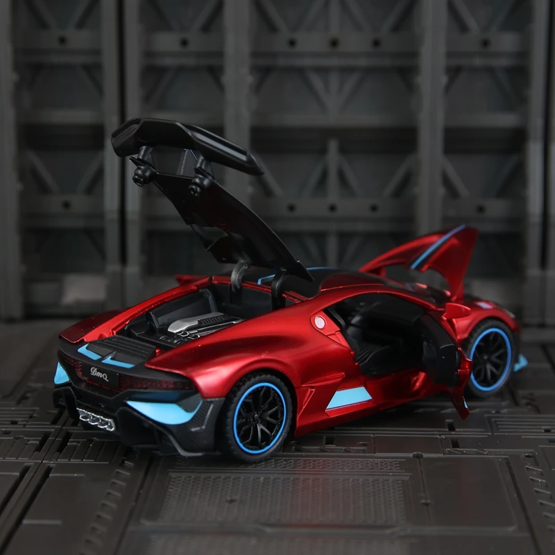

Модель автомобиля Bugatti Divo из сплава 1:32, двери и капот двигателя, багажник можно открыть имеет имитирующие функции звука и освещения.
