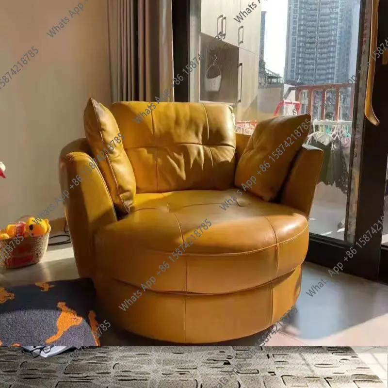 

Italian light luxury orange leather round wide body large living room designer single comfortable reclining and rotating sofa