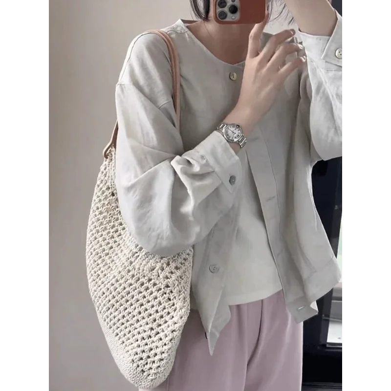 Camicie a maniche lunghe casual versatili in tinta unita alla moda con bottoni girocollo cuciti da donna