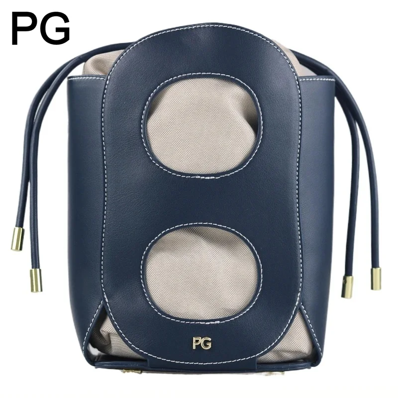 

PG Women Shoulder Bag Retro Hollowed Out Bucket Design High End Niche Design Versatile Daily Commuting Drawstring Crossbody Bag