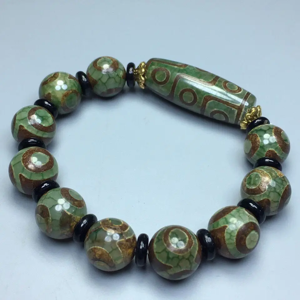 

Authentic Tibetan Green Triple Eye Nine Ancient Dzi Bead Bracelet Agate Chalcedony Ethnic Handcrafted Unisex Spiritual Jewelry