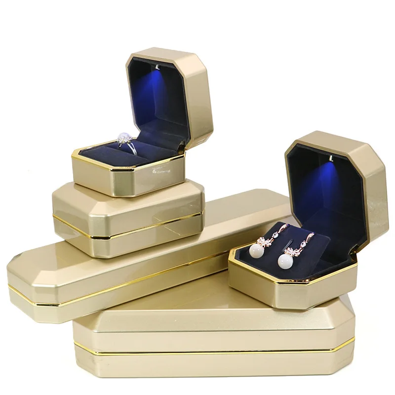 High Quality Golden Lacquer Piano Ring Earrings Necklace Pendant Box with LED Light Plastic Jewelry Storage Box