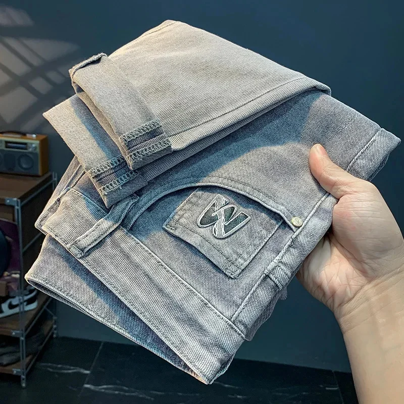 

Светлые джинсы мужские летние тонкие матовые белые облегающие маленькие прямые брюки элитные модные эластичные повседневные брюки с принтом