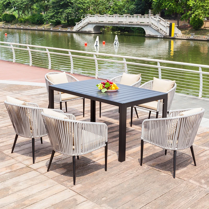 Outdoor balcony tables and chairs, casual rattan chairs, one table and four chairs, designer sample room rattan furniture