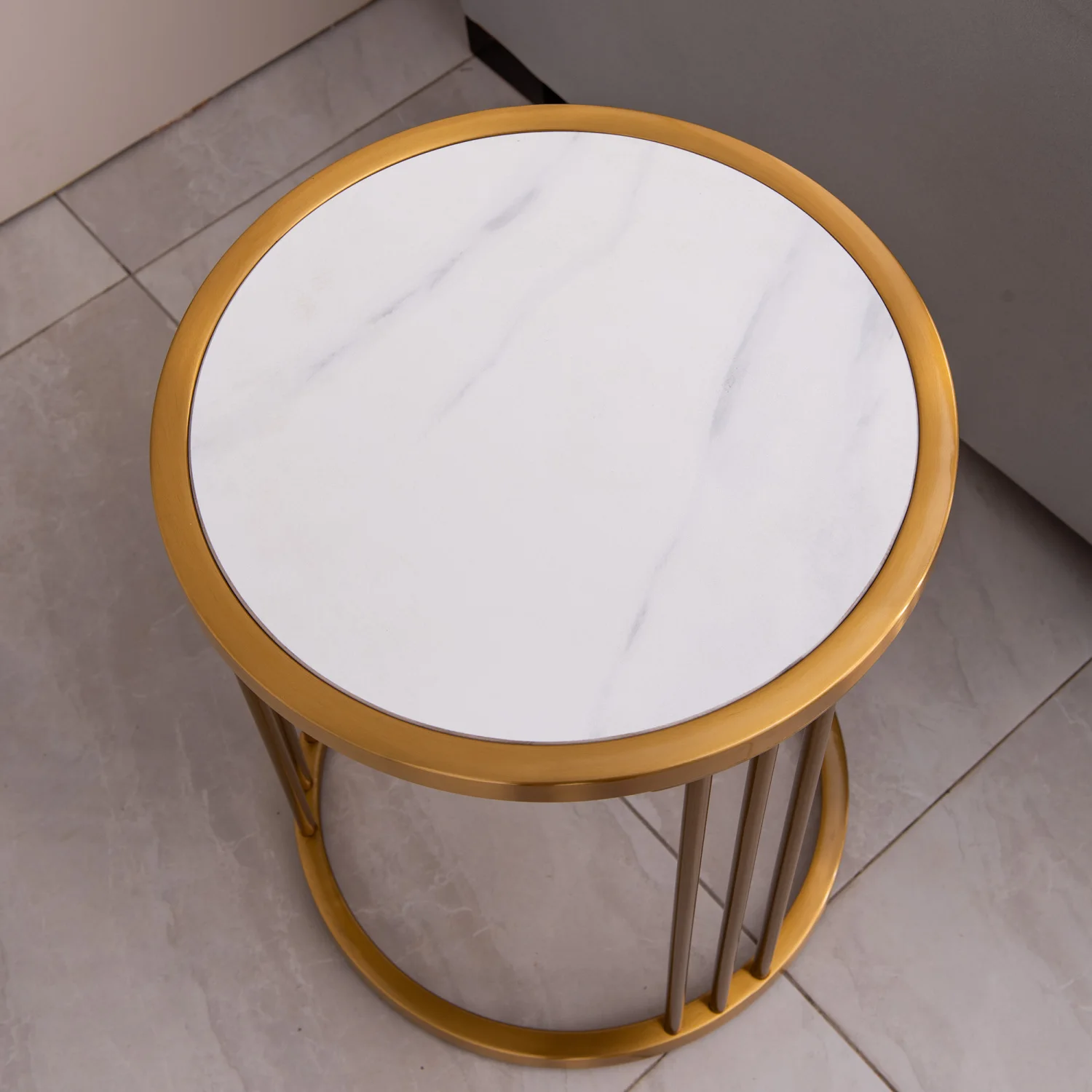 

Slate/sintered stone round side/end table with golden stainless steel frame