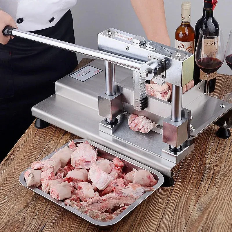 bone cutting machine Manual cutting pig feet Chopping pig trotters Cutting bone chopping machine Small bone sawing machine