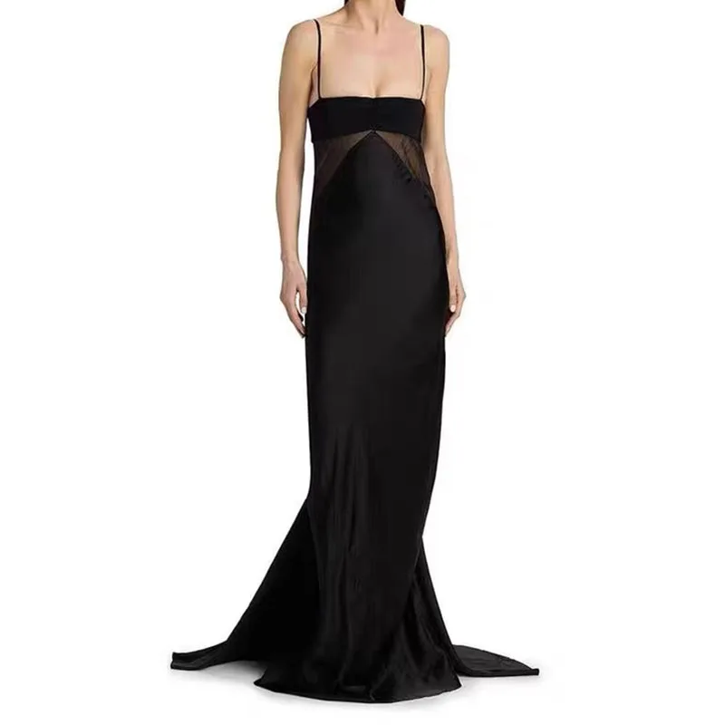 Lady's black long-sleeved strapless dress with sheer net fabric and stretchable design for a formal party gown. 2026 new style.
