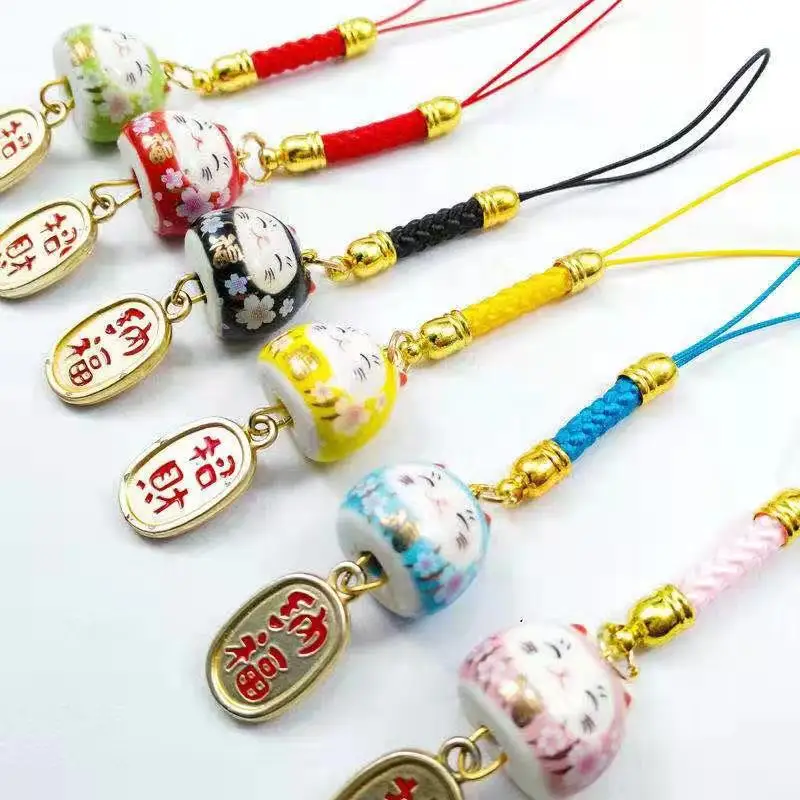 

Pray for good fortune to increase the fortune of ceramic lucky cat cell phone pendant party favors