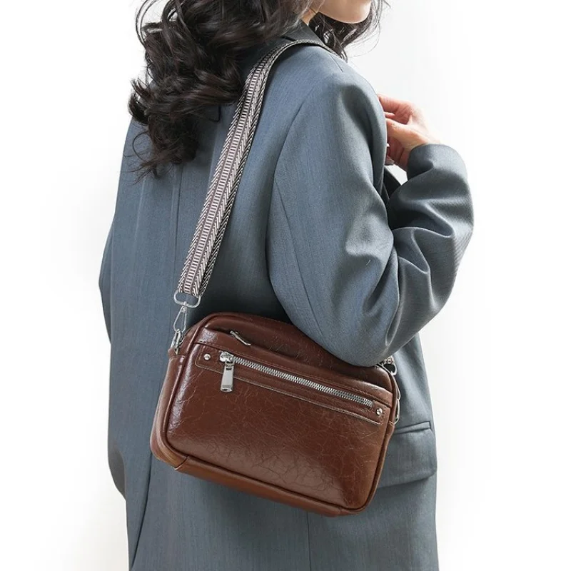 

Elegant Ladies Crossbody Bag Crafted From Fine Leather Boasting Metallic Accent And Spacious Interior For Daily Use​