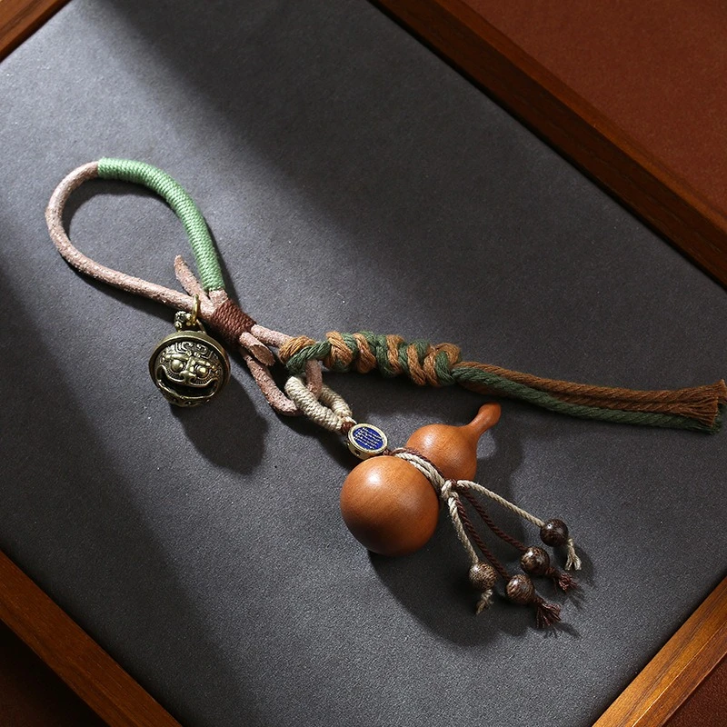 

Jujube wood gourd pendant, wooden carving of fortune, paired with bells, cultural ornaments, wooden ornaments, small car hanging