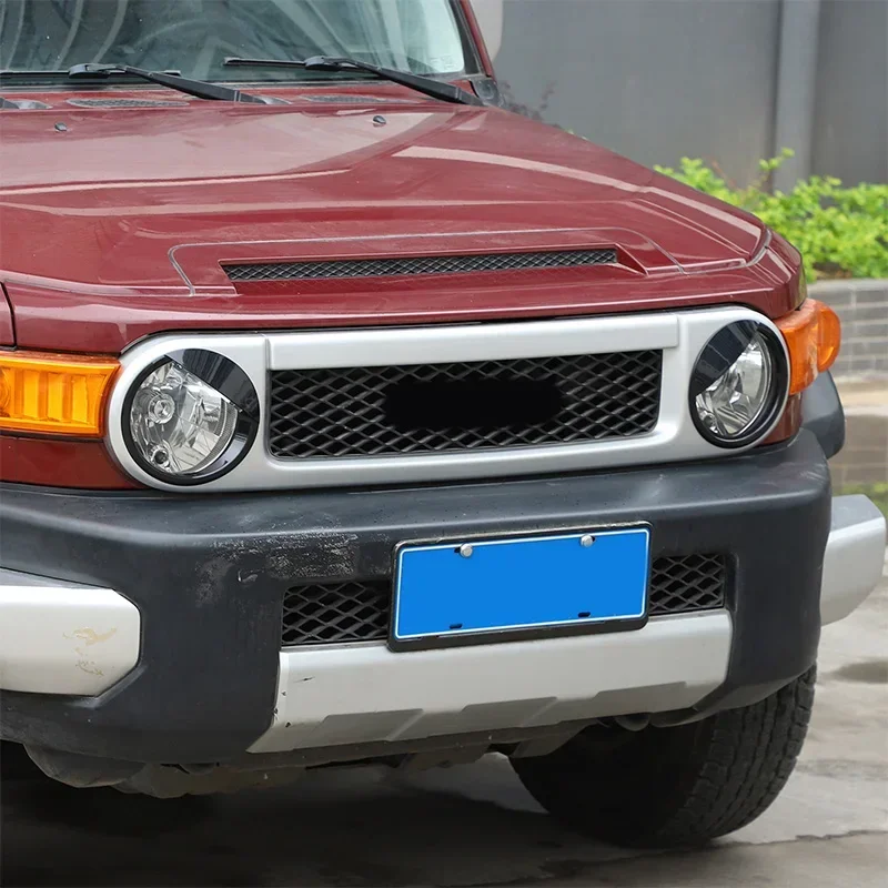 

For 2007-2021 Toyota FJ Cruiser ABS Black Car Shape Headlight Decoration Sticker Car Exterior Protection Accessories