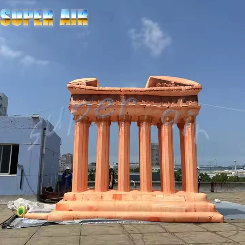 Énorme colonnes romaines rétro, colonne gonflable orange avec souffleur pour la décoration