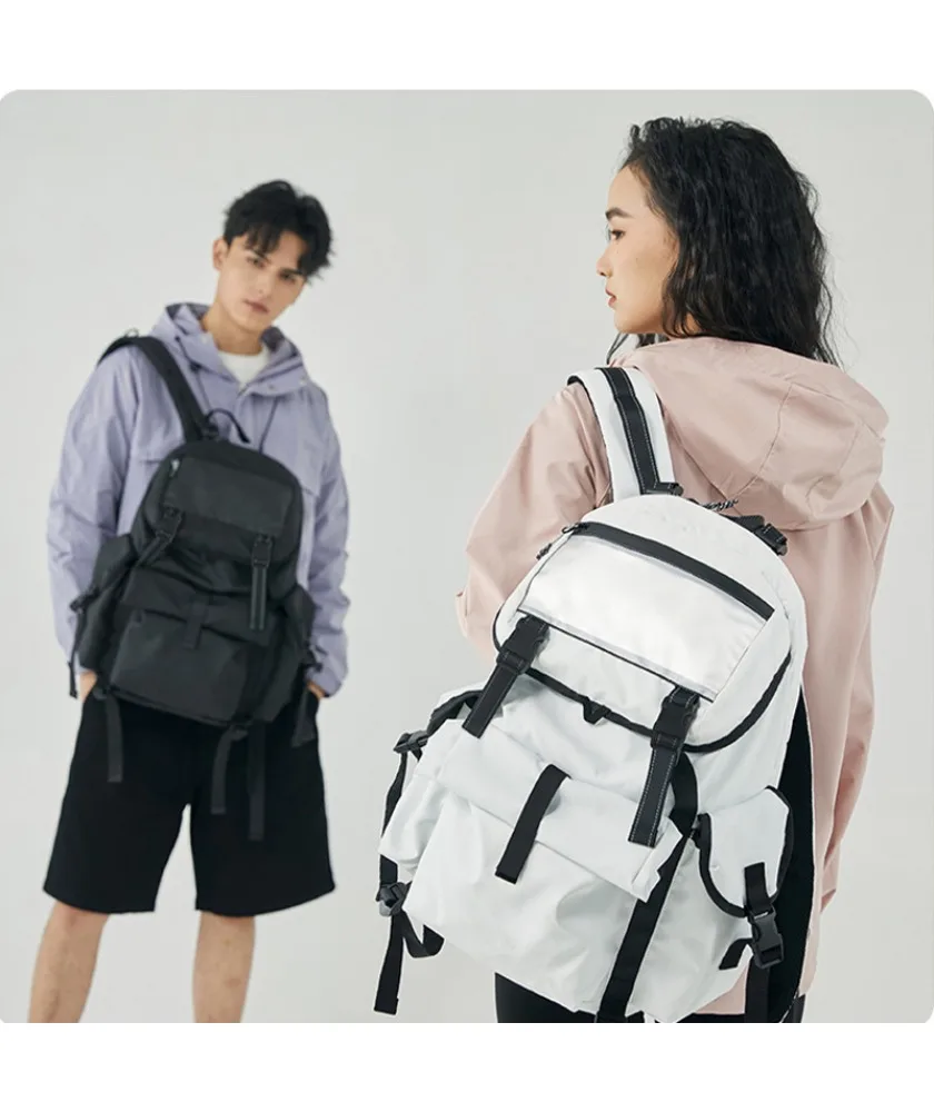 

Black tactical style backpack with multiple compression straps drawstring closure water resistant fabric for hiking camping