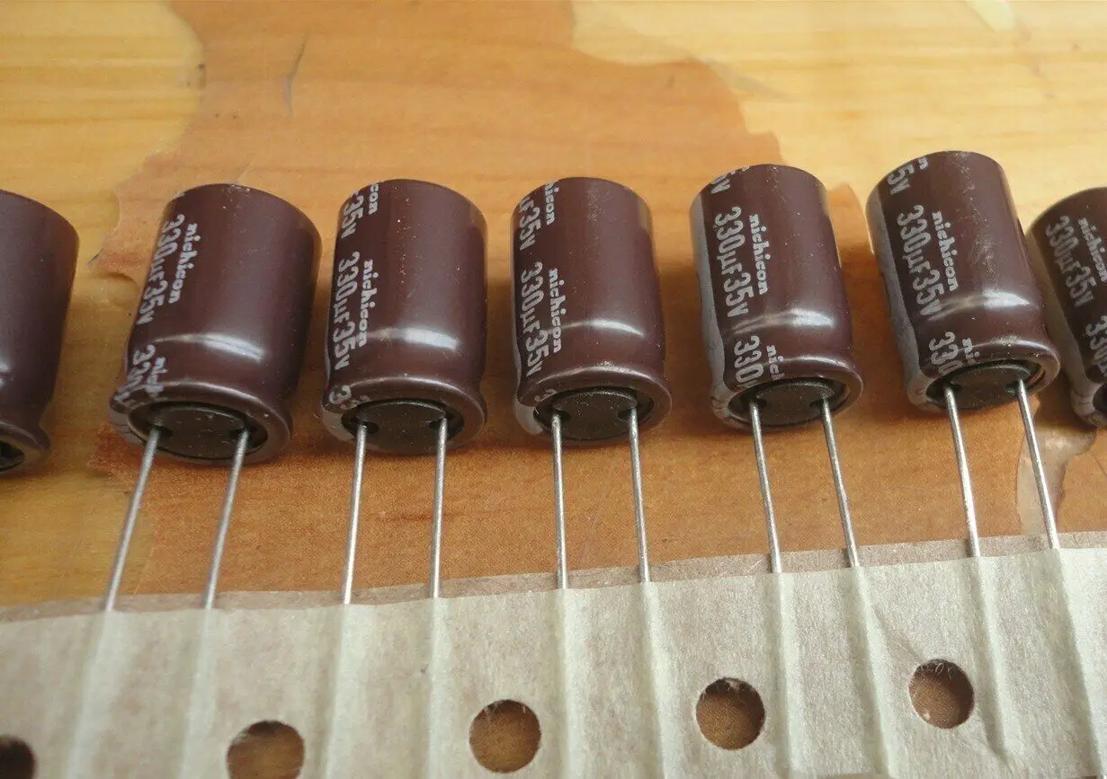 

50PCS NICHICON PW 35V 330UF 10X16MM electrolytic capacitor long life