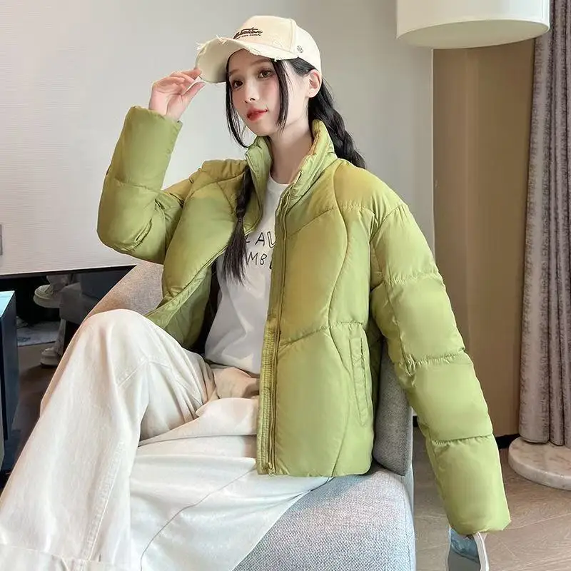 เสื้อโค้ทกันหนาวผู้หญิง แขนยาว คอตั้ง ทรงหลวม บุใยฝ้าย หนานุ่ม อุ่นสบาย สไตล์ลำลอง ปี 2025