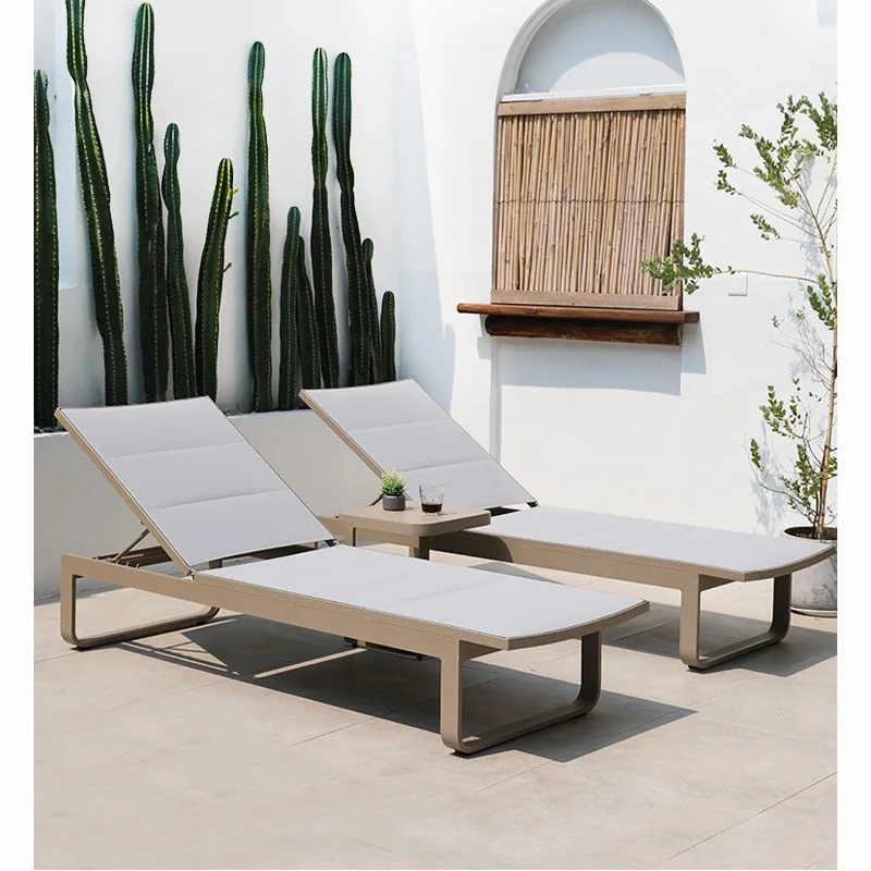 Beach chairs loungers villa courtyard outdoor swimming pool