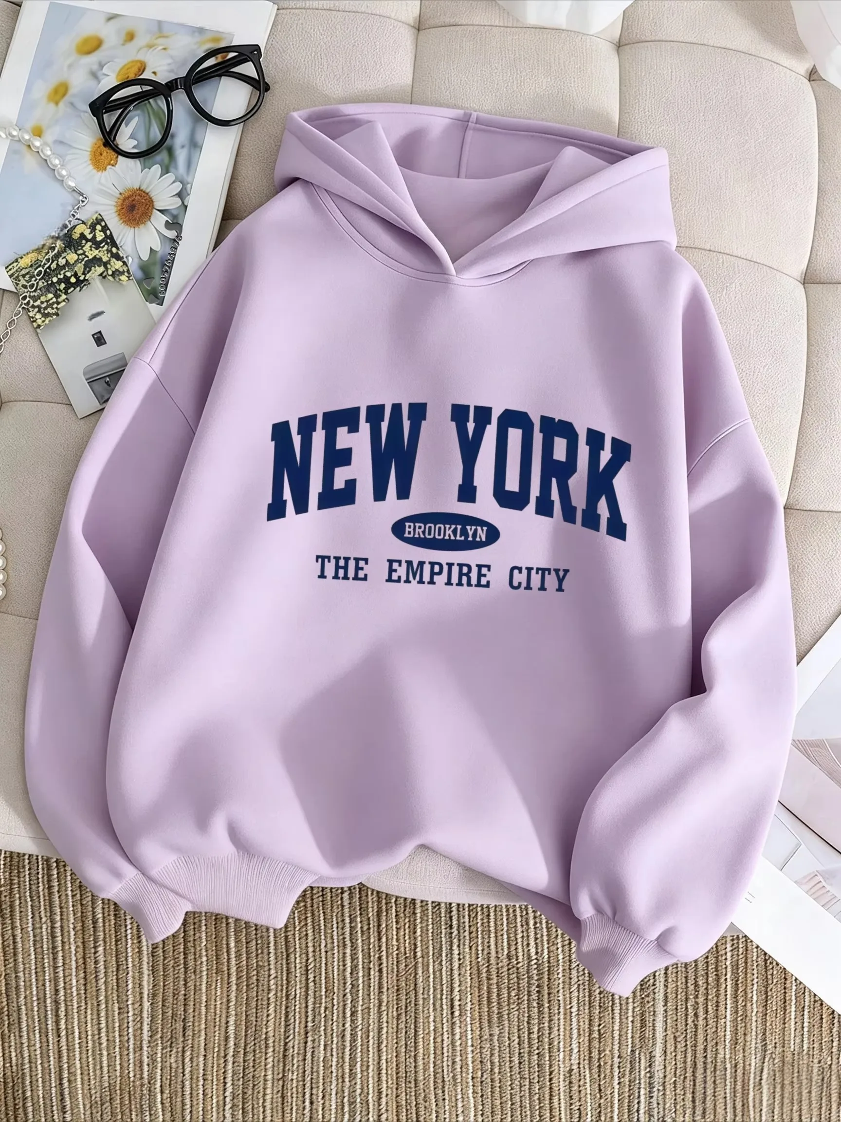 American-style college style. NEW YORK - Brooklyn, NY. Dark blue letter-printed children's hooded sweatshirt.