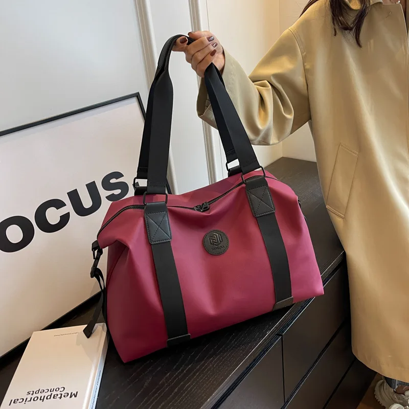 Bolso de viaje de gran capacidad para hombre y mujer, bolsa de hombro deportiva de color negro, sencillo, a la moda, nuevo diseño, 2023