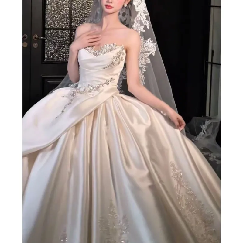 Satin heavy off-the-shoulder, strapless, and textured tulle for a dress