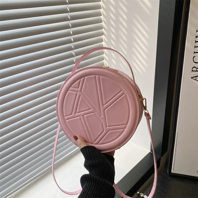 Solid color hand-held small round bag 2025 new bag, women's fashion shoulder bag, casual personalized crossbody bag