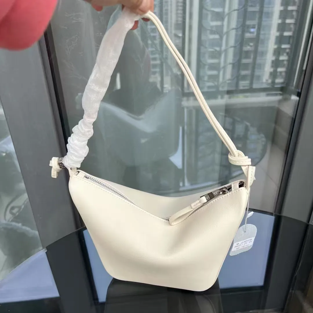 

Hammock bag High texture cowhide armpit bag Commuter versatile diagonal span pillow bag Women