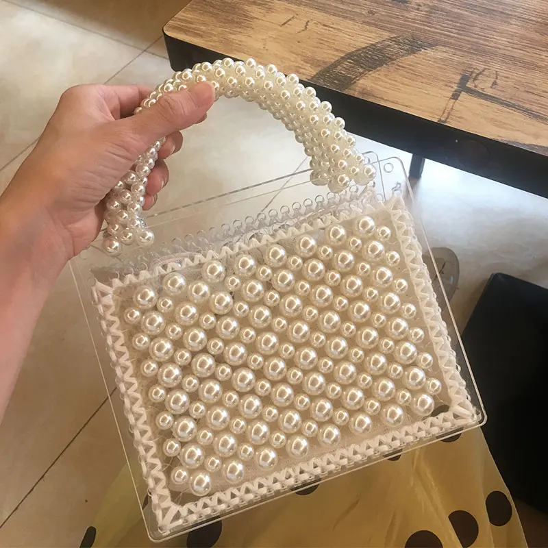 Pure hand-beaded Pearl Shoutibaoyakeli 2019 new fashion temperament women\'s single shoulder oblique span knitting bag