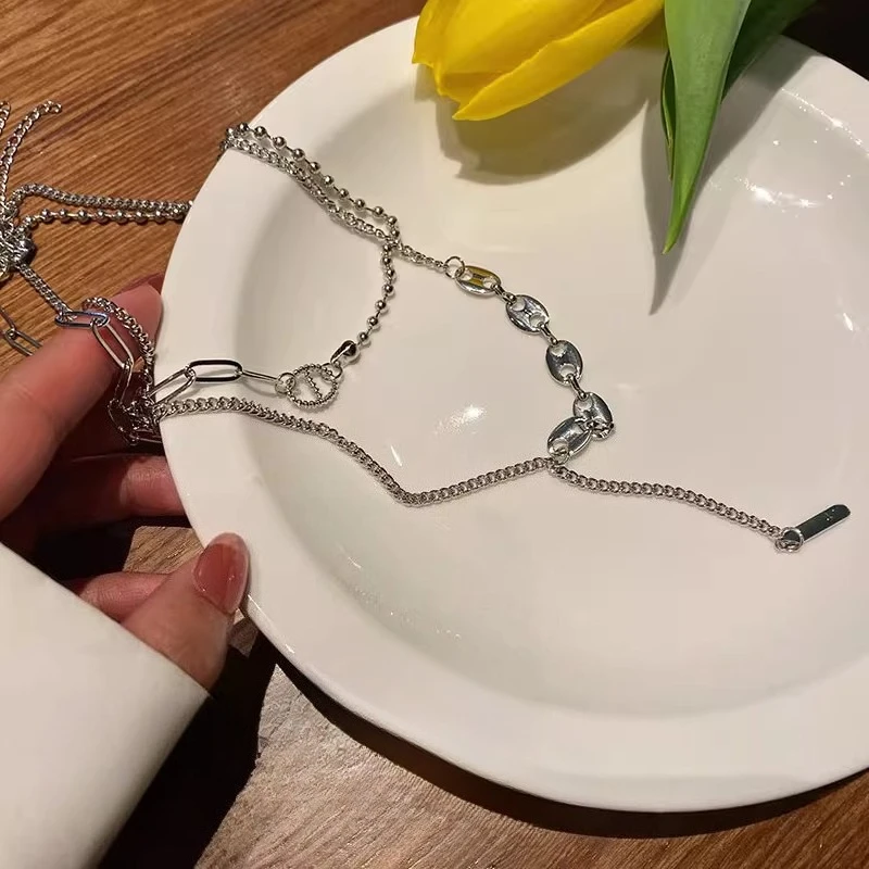 سترة من النوع الثقيل ذات سلسلة شرابة فاخرة وخفيفة الوزن بتصميم نسائي وإكسسوارات سلسلة الترقوة بمزاج بسيط