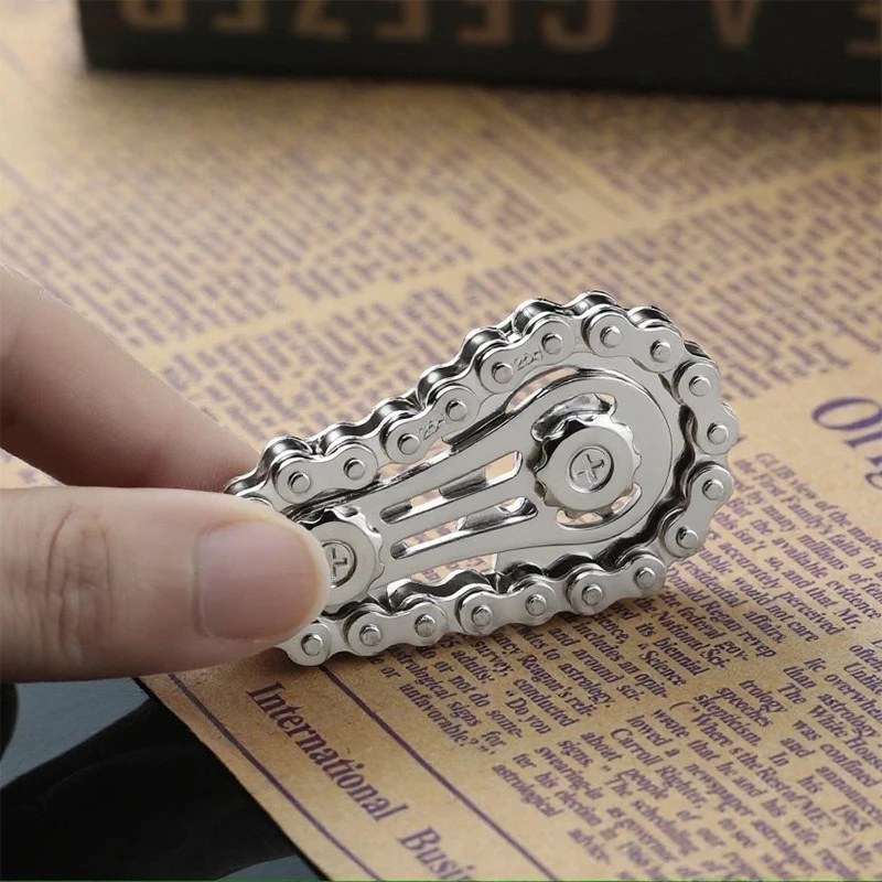 Roda dentada volante volante superior disco voador anti-ansiedade ornamentos corrente de bicicleta de metal edc disco voador rotativo brinquedo adulto