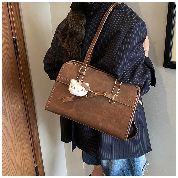 

Новая женская большая сумка 2025 года — корейский рюкзак в стиле ретро со съемными ремнями, легкий и вместительный для поездок на работу и колледж