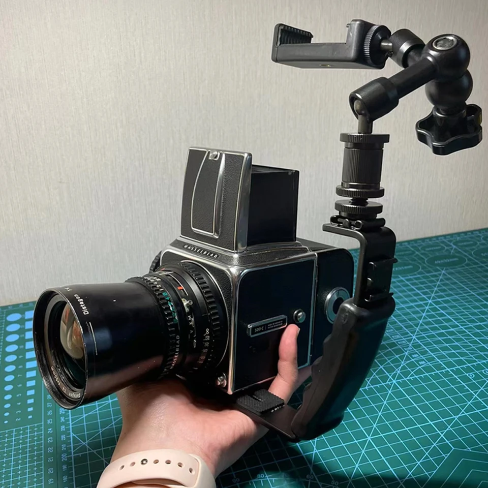 フィルムカメラ携帯電話オーバーヘッド撮影ウエストレベルビュー