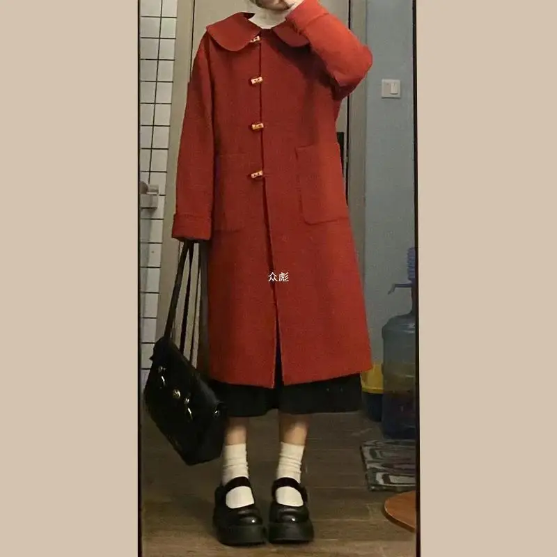 Advanced Japanese doll collar woolen coat women's medium and long 2023 autumn and winter small man horn buckle wool