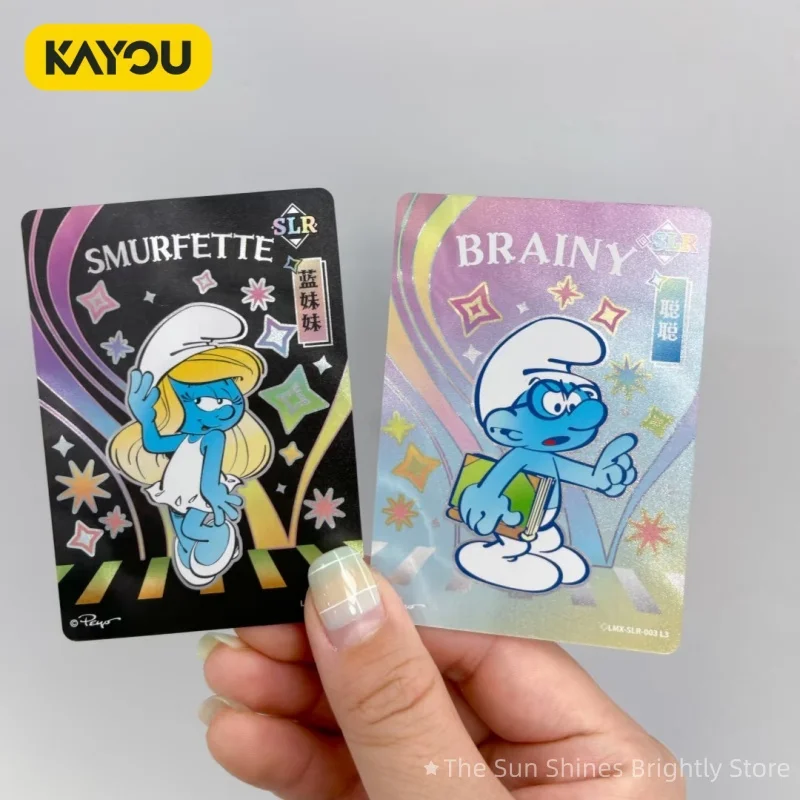 KAYOU Smurfs Adventure Pack Periferico da gioco ufficiale Giocattolo da collezione Gioco di prima scelta Carta da collezione Articolo autentico per hobby